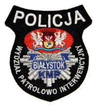 Fotografia kolorowa przedstawiająca naszywkę Wydziału Patrolowo-Interwencyjnego