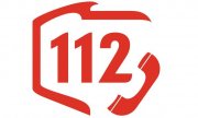 czerwony numer alarmowy 112 na białym tle