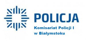 na białym tle niebieski napis Policja komisariat policji I w Białymstoku