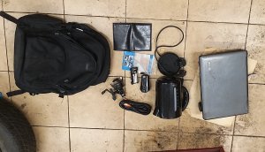 RZECZY ODNALEZIONE PRZEZ POLICJANTÓW - plecak koloru czarnego, portfel koloru czarnego, czajnik elektryczny koloru czarnego, kołowrotek wędkarski, laptop.